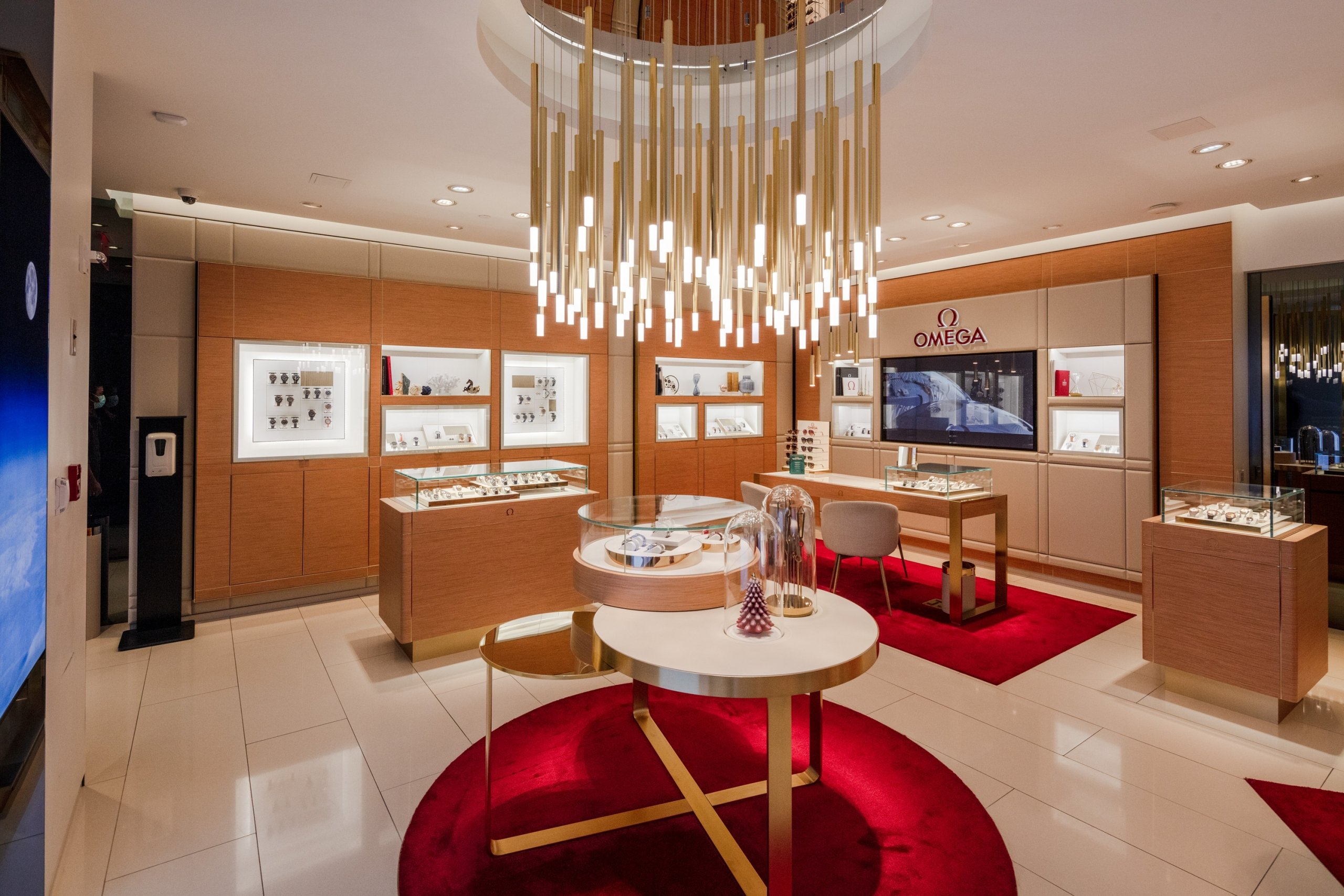 Elegant room interior with a large chandelier at Omega store