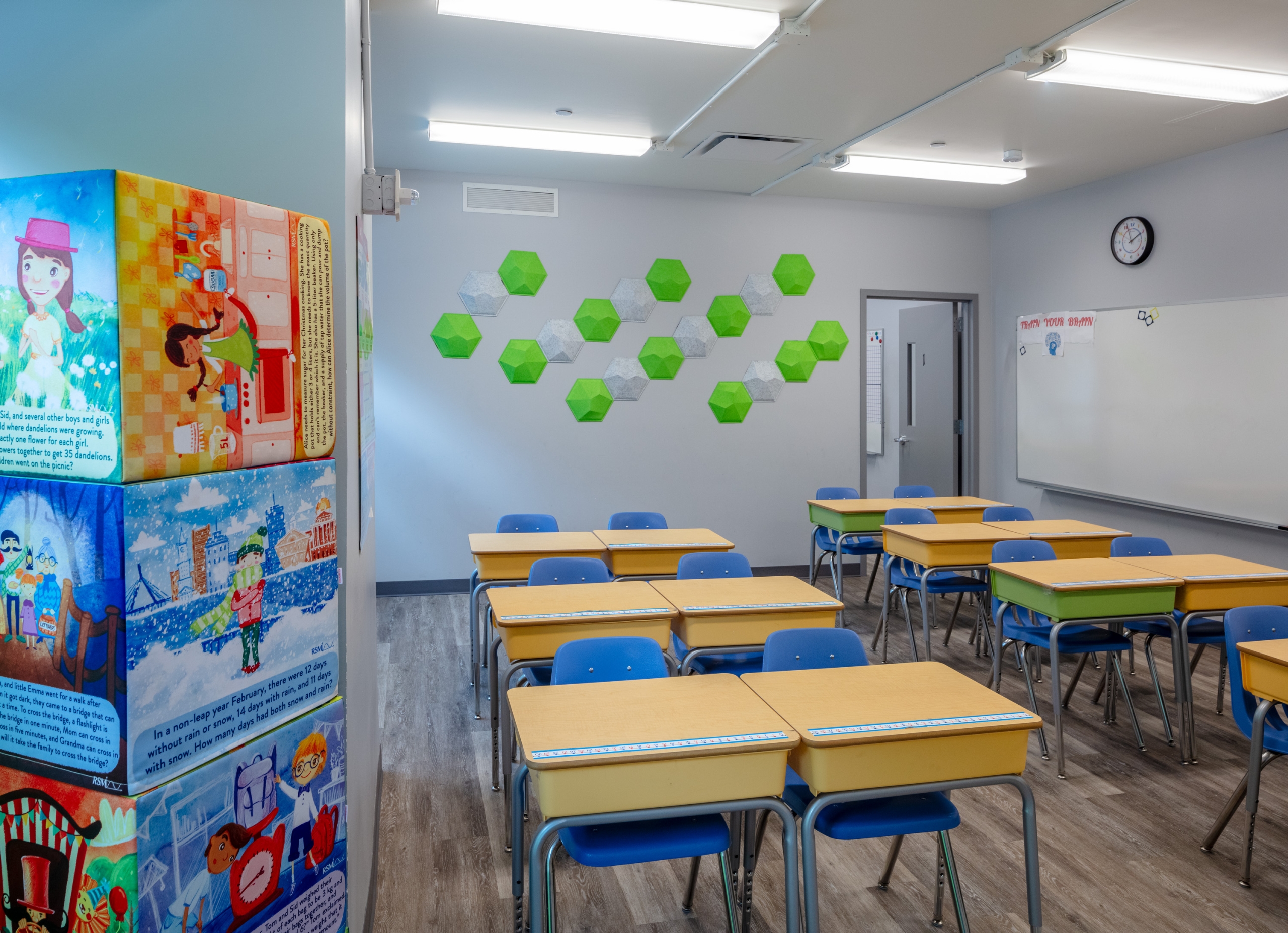 Colorful children's play area or education center with bright blue and yellow furniture.