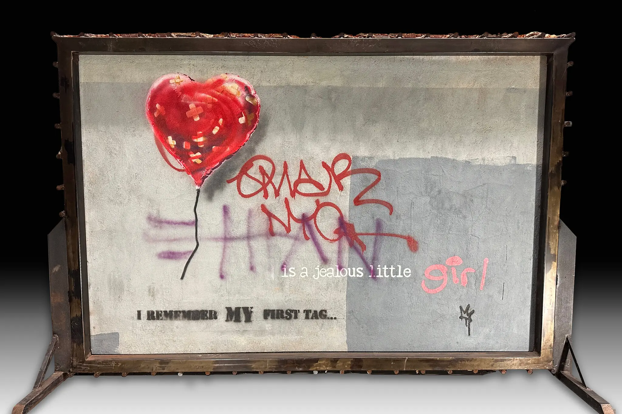 A close-up of the Banksy artwork 